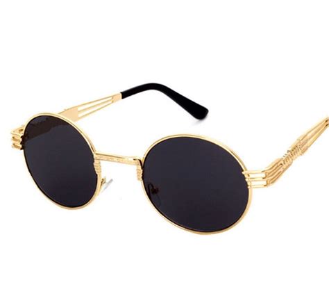round black and gold sunglasses